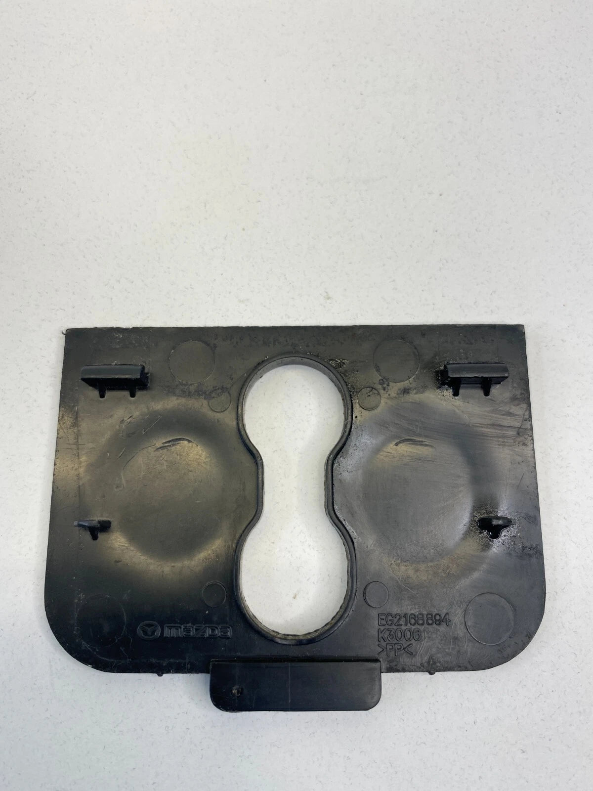 2007-2012 MAZDA CX-7 REAR INTERIOR TRUNK COMPARTMENT LOCK BEZEL OEM EG2168894