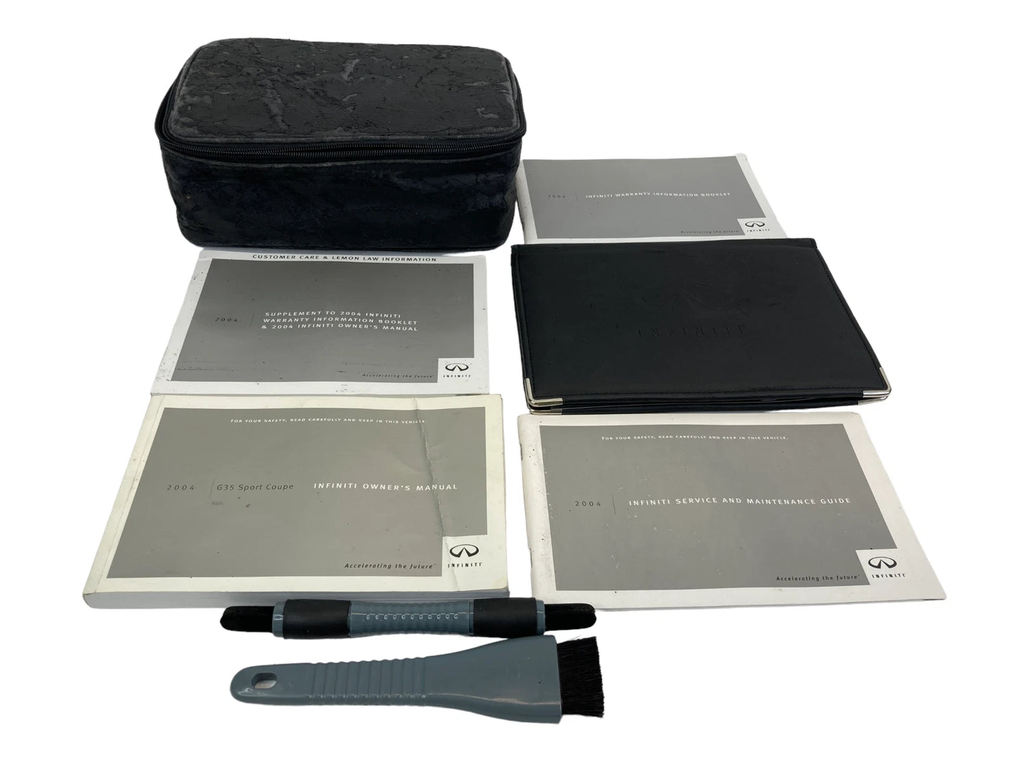 2004 INFINITI G35 COUPE OWNER'S MANUAL WARRANTY INFORMATION BOOKLET W/ CASE