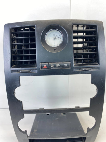 2005-2007 CHRYSLER 300 DASH RADIO BEZEL W/ AIR VENTS PANEL & CLOCK 04602385AC