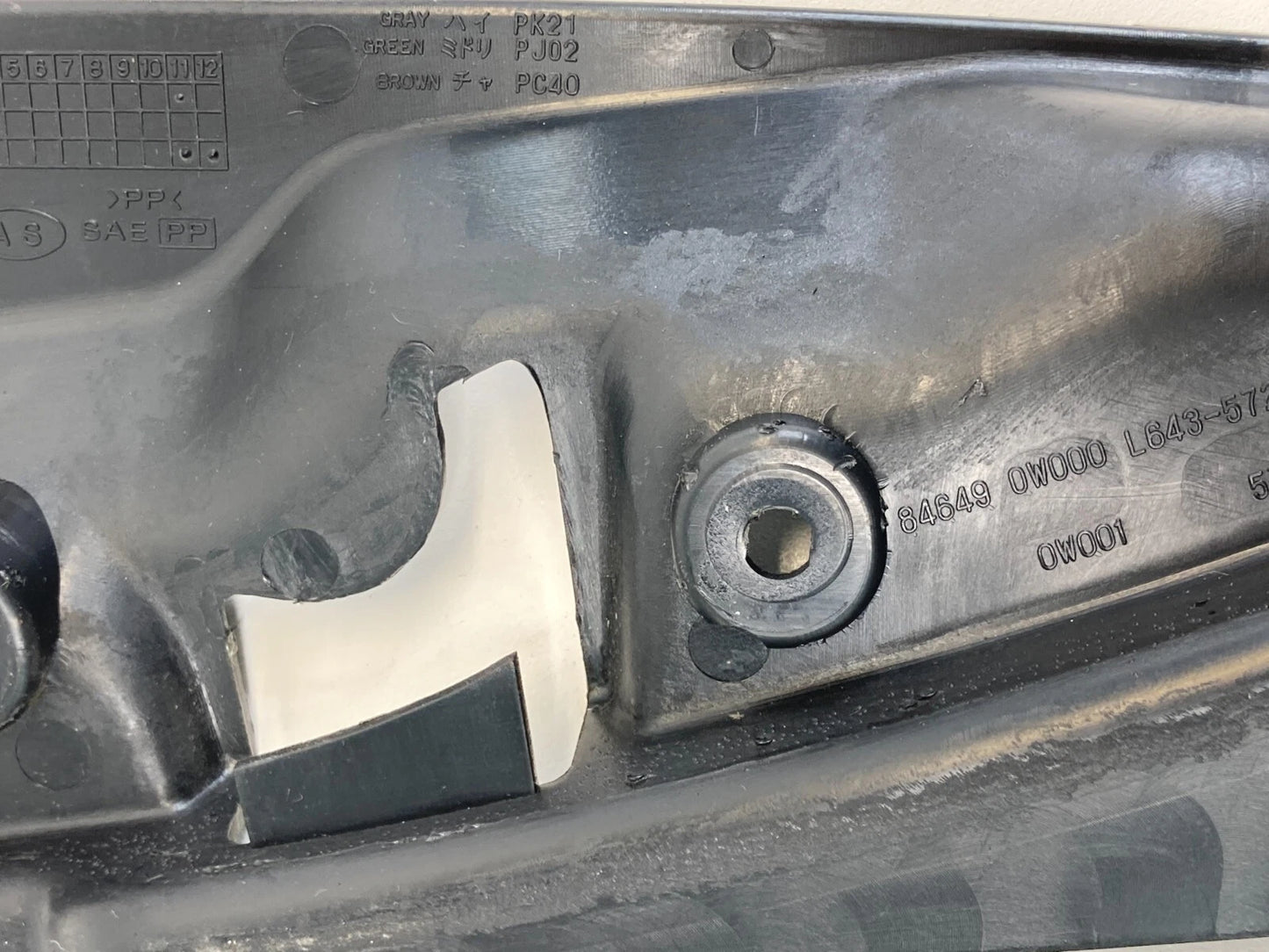 1996-2002 NISSAN PATHFINDER FUEL FILLER DOOR RELEASE HANDLE TRIM COVER 846490W00