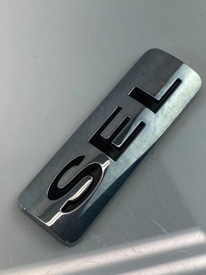 2008-2011 FORD FOCUS SEDAN SEL REAR HATCH TRUNK LID EMBLEM LOGO TRIM OEM