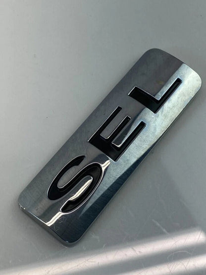 2008-2011 FORD FOCUS SEDAN SEL REAR HATCH TRUNK LID EMBLEM LOGO TRIM OEM