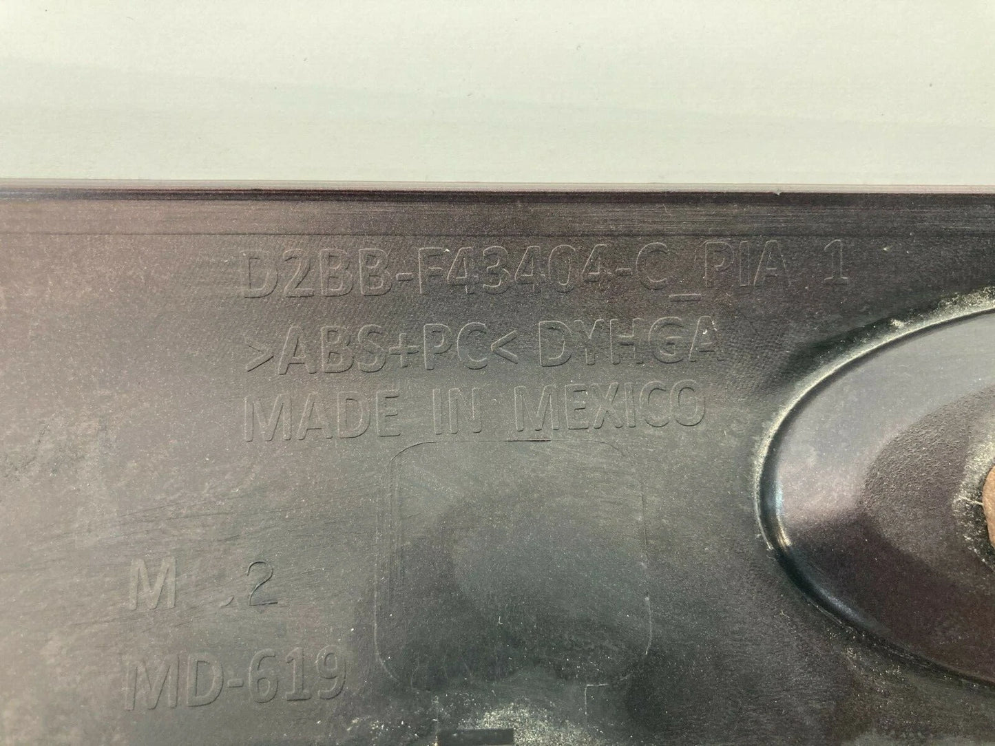 2014-2019 FORD FIESTA SEDAN TRUNK LID LICENSE MOLDING W EMBLEM RUBY RED OEM