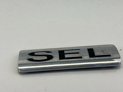 2008-2011 FORD FOCUS SEDAN SEL REAR HATCH TRUNK LID EMBLEM LOGO TRIM OEM