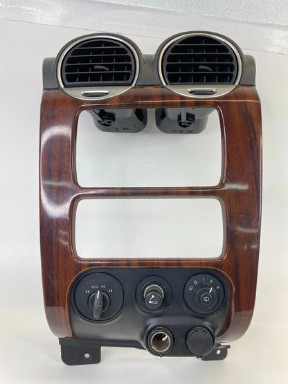 2002-2006 GMC ENVOY XL 02-09 ENVOY DASH RADIO BEZEL TRIM W/ AIR VENT & SWITCHES