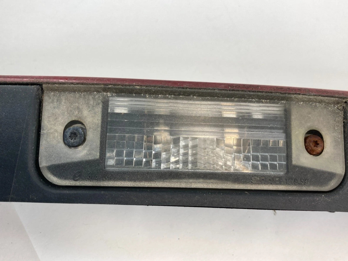 03-07 SAAB 9-3 93 SEDAN TRUNK LID LICENSE PLATE MOLDING HANDLE PANEL 12794599