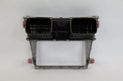 2007-2012 TOYOTA YARIS CENTER DASH RADIO BEZEL W/ AIR VENTS & HAZARD SWITCH OEM