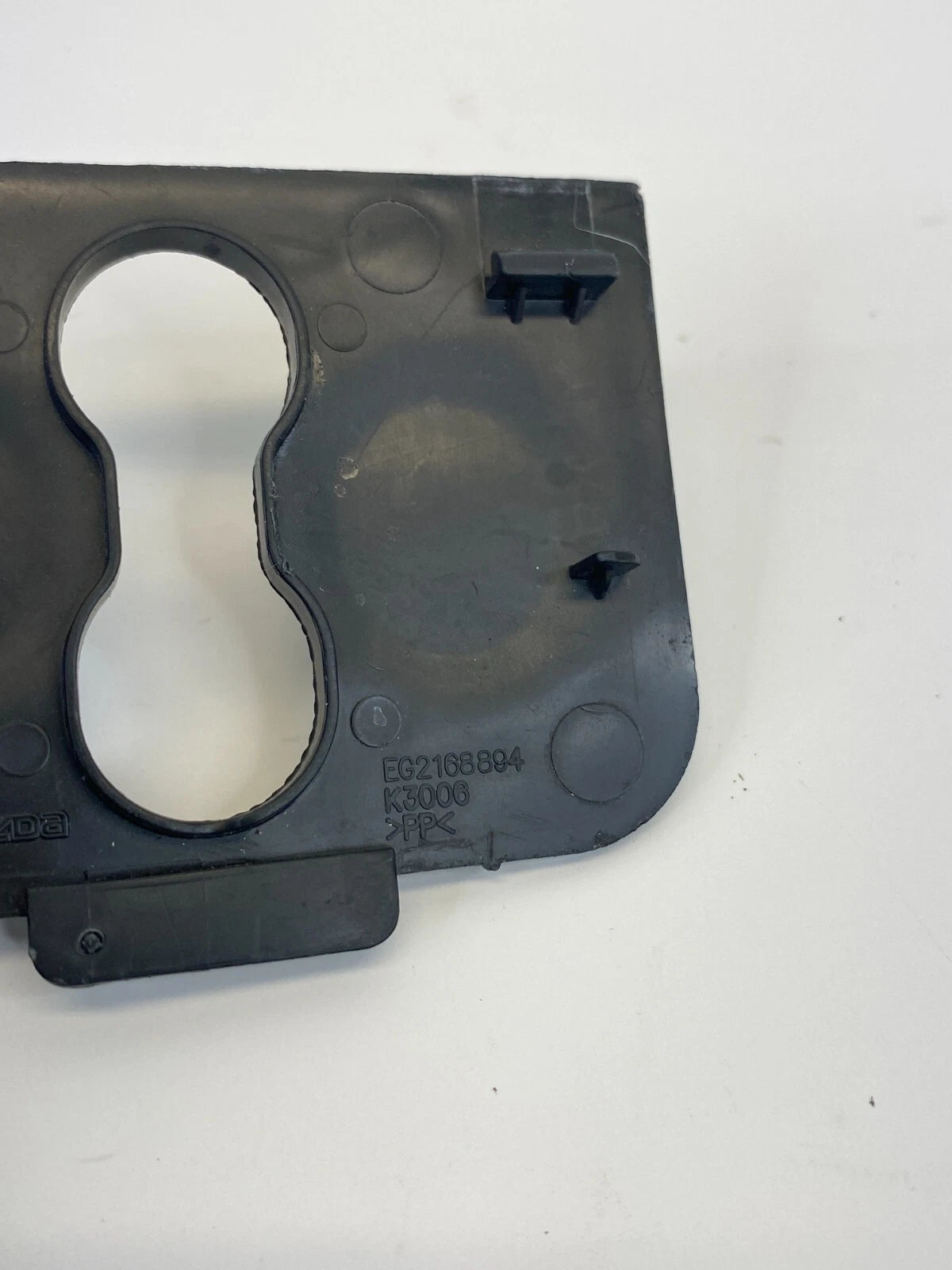 2007-2012 MAZDA CX-7 REAR INTERIOR TRUNK COMPARTMENT LOCK BEZEL TRIM EG2168894