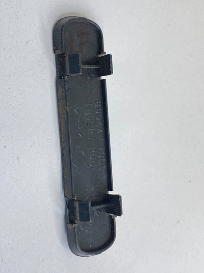 2007-2009 NISSAN SENTRA FRONT LEFT SIDE DOOR PULL HANDLE SCREW COVER 80944-ET000