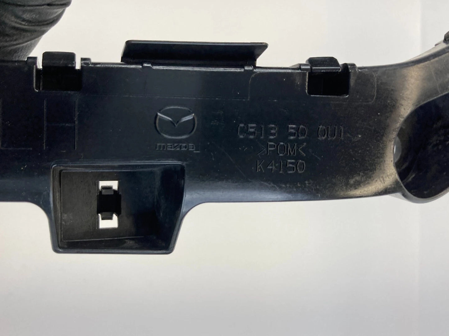 2012-2015 MAZDA 5 MAZDA5 FRONT LEFT BUMPER RETAINER BRACKET COVER C513500U1 OEM