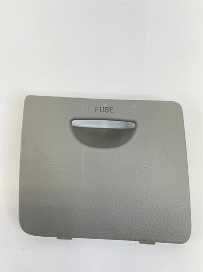 2004-2009 KIA SPECTRA DASH INSTRUMENT PANEL FUSE BOX ACCESS COVER DOOR LID PANEL