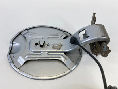 2008-2011 FORD FOCUS SEDAN FUEL FILLER GAS DOOR LID COVER W/ CAP OEM