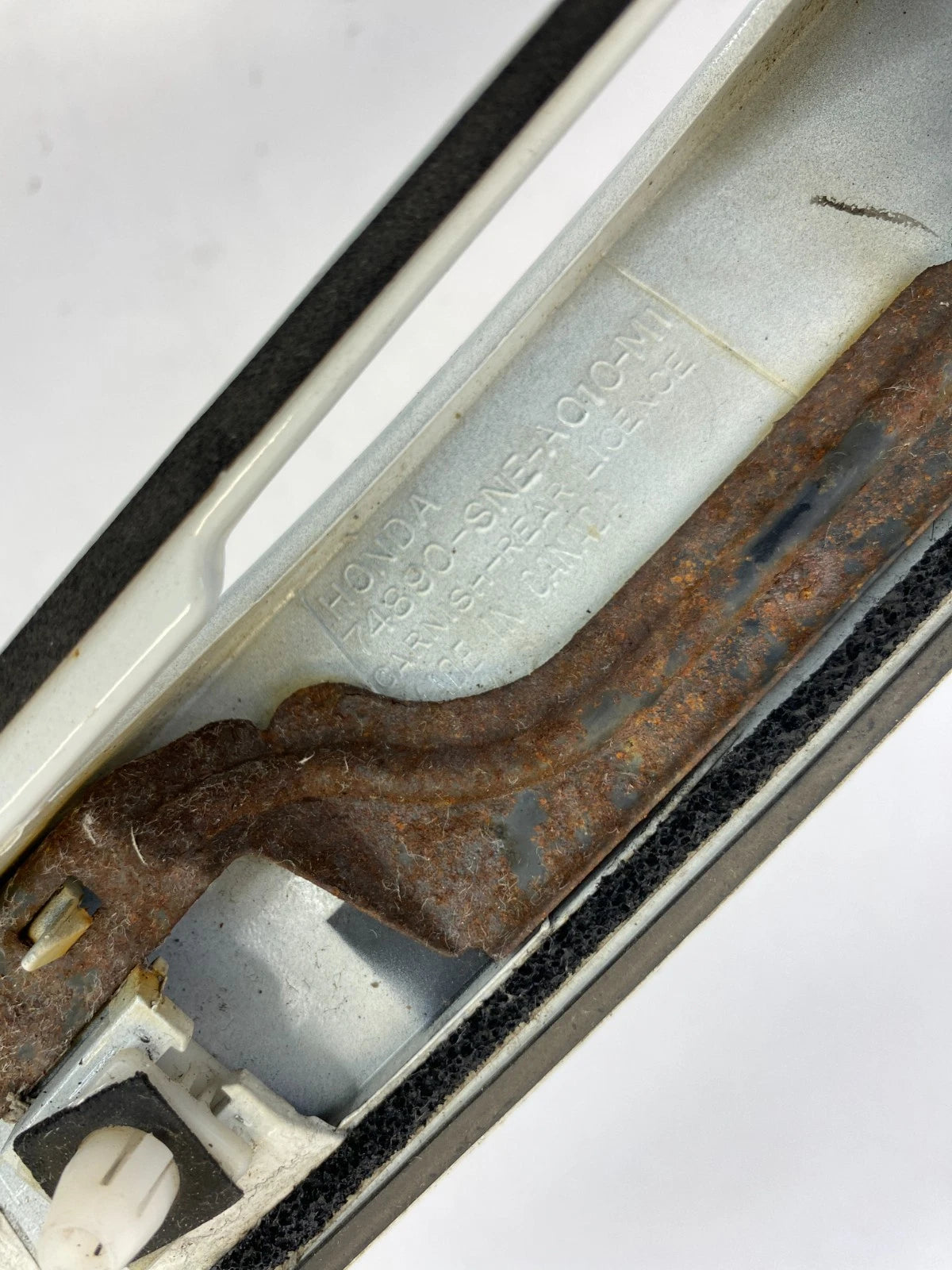 2006-2011 HONDA CIVIC SEDAN REAR TRUNK LICENSE GARNISH MOLDING 74890-SNE-A010