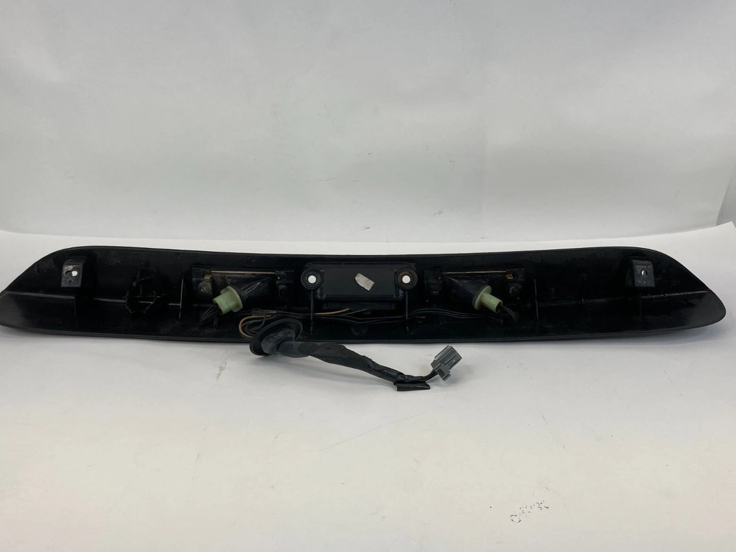 01-05 DODGE CARAVAN REAR TRUNK LIFT GATE LICENSE PLATE HANDLE PANEL 04857231AE