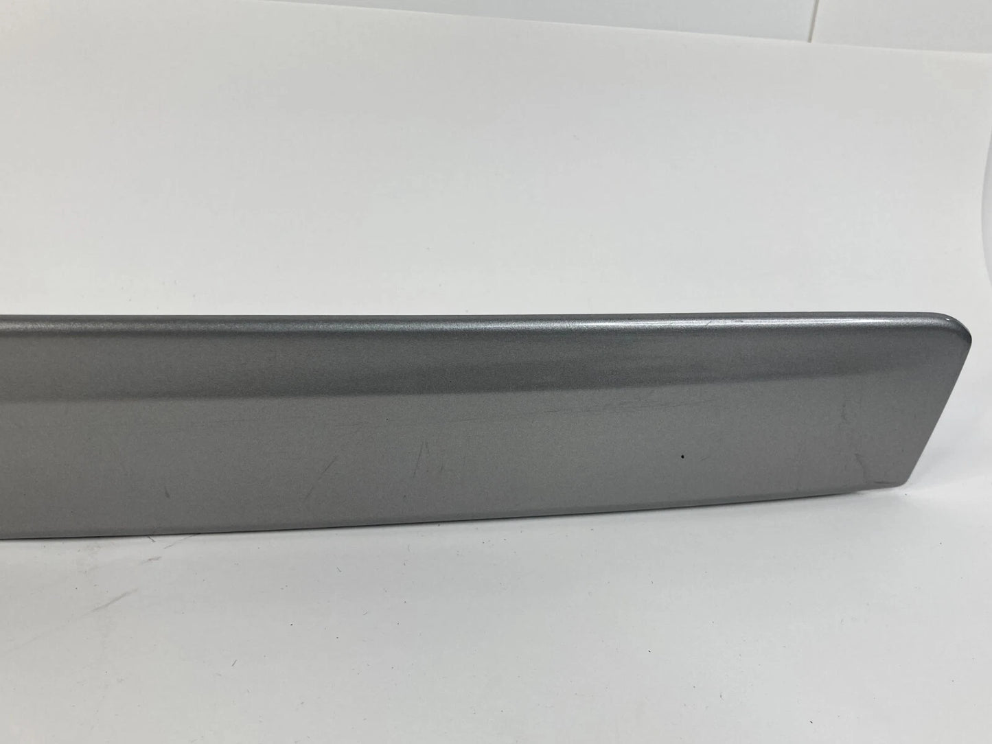 10-14 SUBARU LEGACY REAR TRUNK HANDLE LICENSE MOLDING PANEL TRIM 91112AJ00A OEM