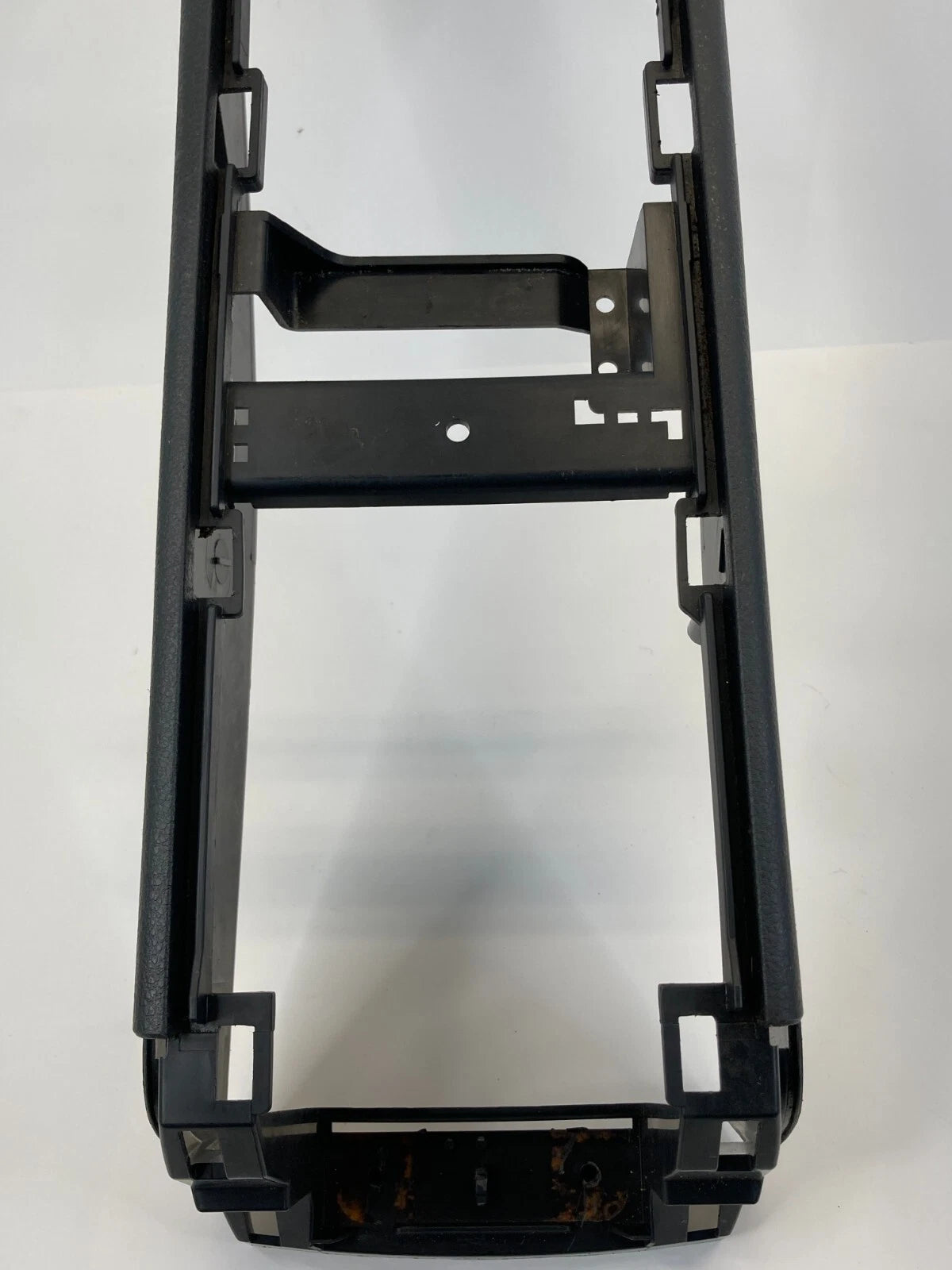 07-12 NISSAN VERSA FRONT FLOOR CENTER CONSOLE BASE BODY FRAME TRIM 96911-EL00A