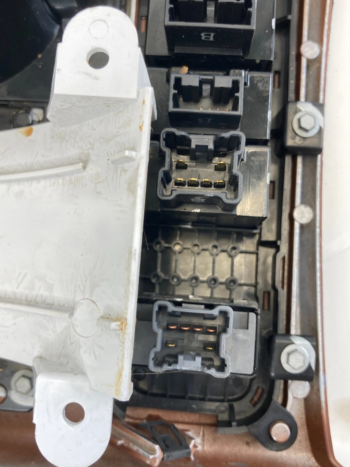 08-10 INFINITI QX56 08-15 NISSAN ARMADA CENTER CONSOLE SHIFTER BEZEL CUP HOLDER