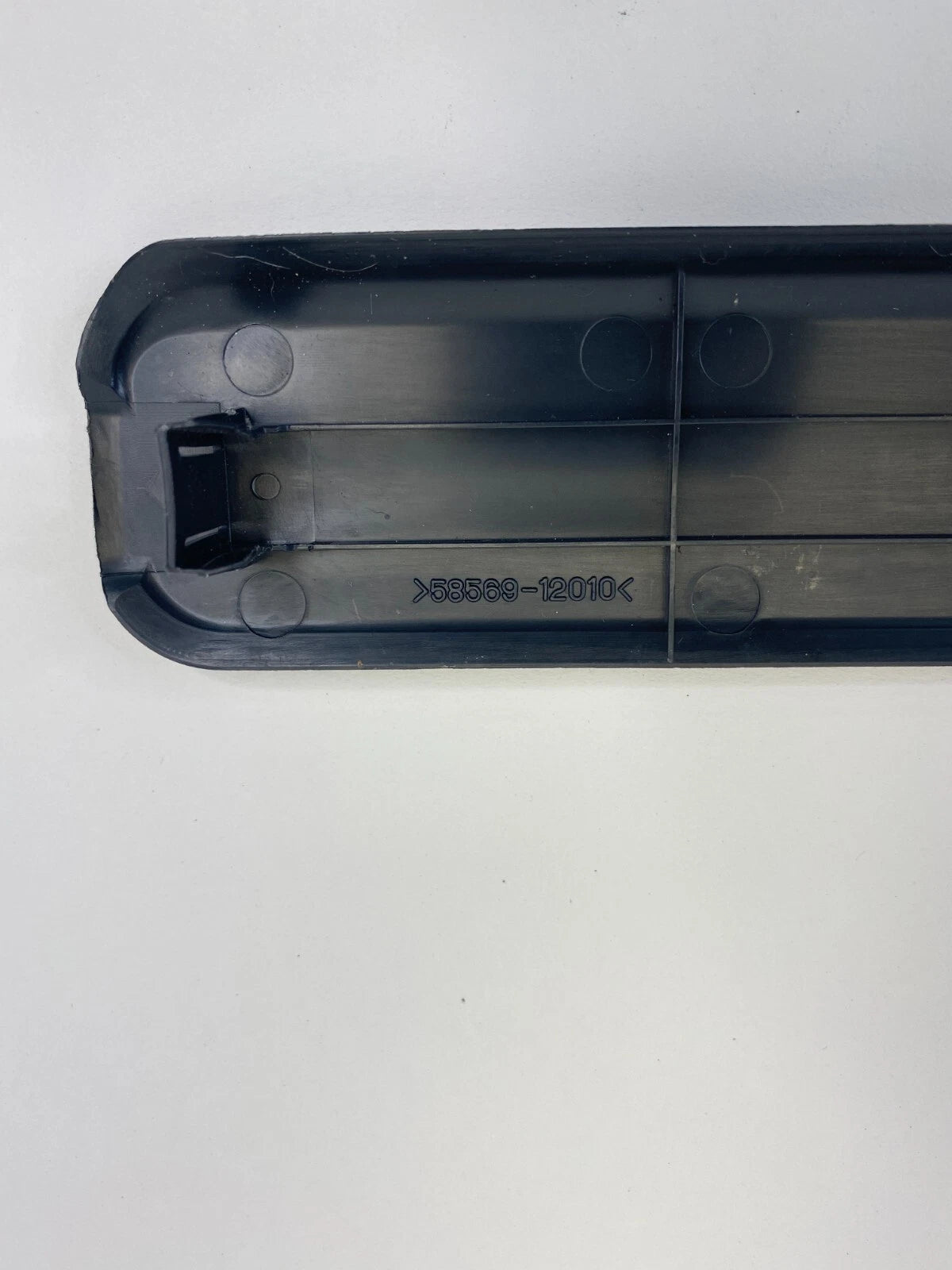 08-15 SCION XB 09-13 COROLLA FLOOR CAUTION PLATE FRAME COVER 58569-12010 OEM