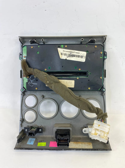 05 06 NISSAN ARMADA CD RADIO PLAYER RECEIVER CLIMATE HEATER CONTROL BEZEL PANEL