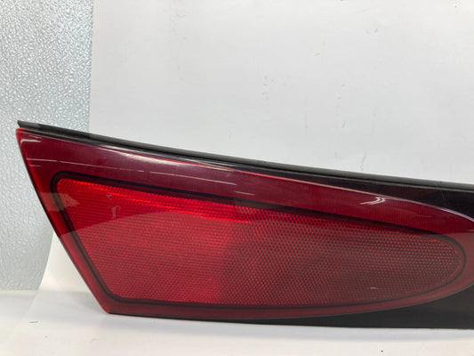 1997-2002 FORD ESCORT SEDAN REAR CENTER TRUNK LID TAIL LIGHT FINISH PANEL OEM