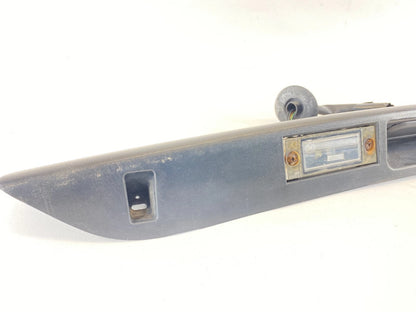 01-05 DODGE GRAND CARAVAN REAR LICENSE PLATE LIGHT FILLER MOULDING 04857231AE