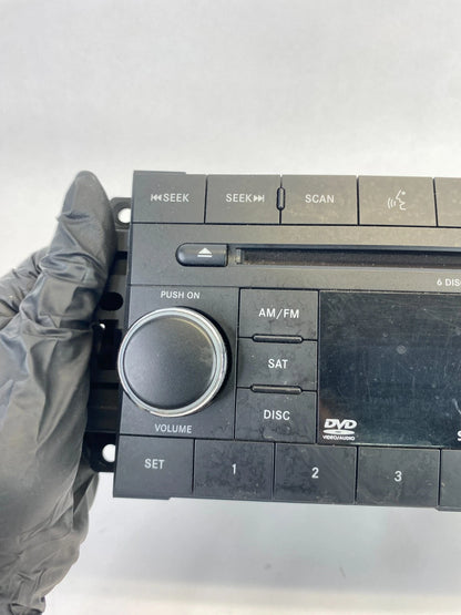 2009 2010 DODGE JOURNEY AM FM 6 DISC CD DVD RADIO PLAYER ASSEMBLY 5064942AC OEM