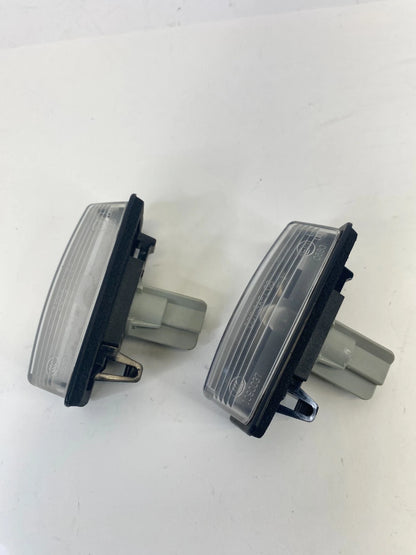 08-13 2008-2013 Nissan Rogue Rear Trunk License Plate Light Lamp Assembly OEM