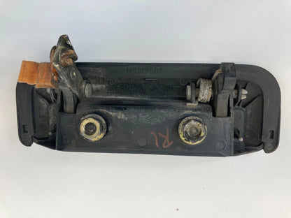 1997-2004 MITSUBISHI MONTERO SPORT REAR LEFT BACK SIDE EXTERIOR DOOR HANDLE OEM