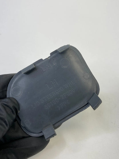 2004-2009 KIA SPECTRA LEFT SIDE STEERING WHEEL LID CAP 56190-2F000 OEM