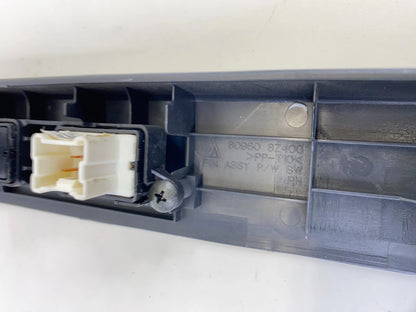 2000-2004 NISSAN XTERRA FRONT RIGHT WINDOW CONTROL SWITCH W/ BEZEL OEM