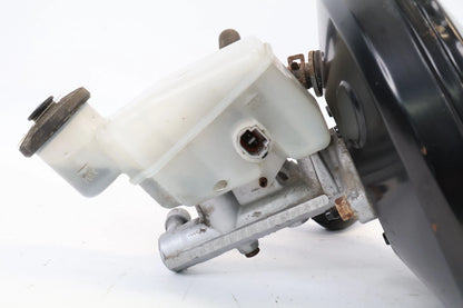 2007-2012 TOYOTA YARIS SEDAN 1.5L L4 A/T POWER BRAKE BOOSTER MASTER CYLINDER OEM