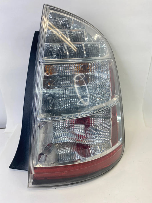 06-09 TOYOTA PRIUS PASSENGER SIDE TAIL LIGHT TAILLIGHT LAMP ASSY AIP2R3ST OEM