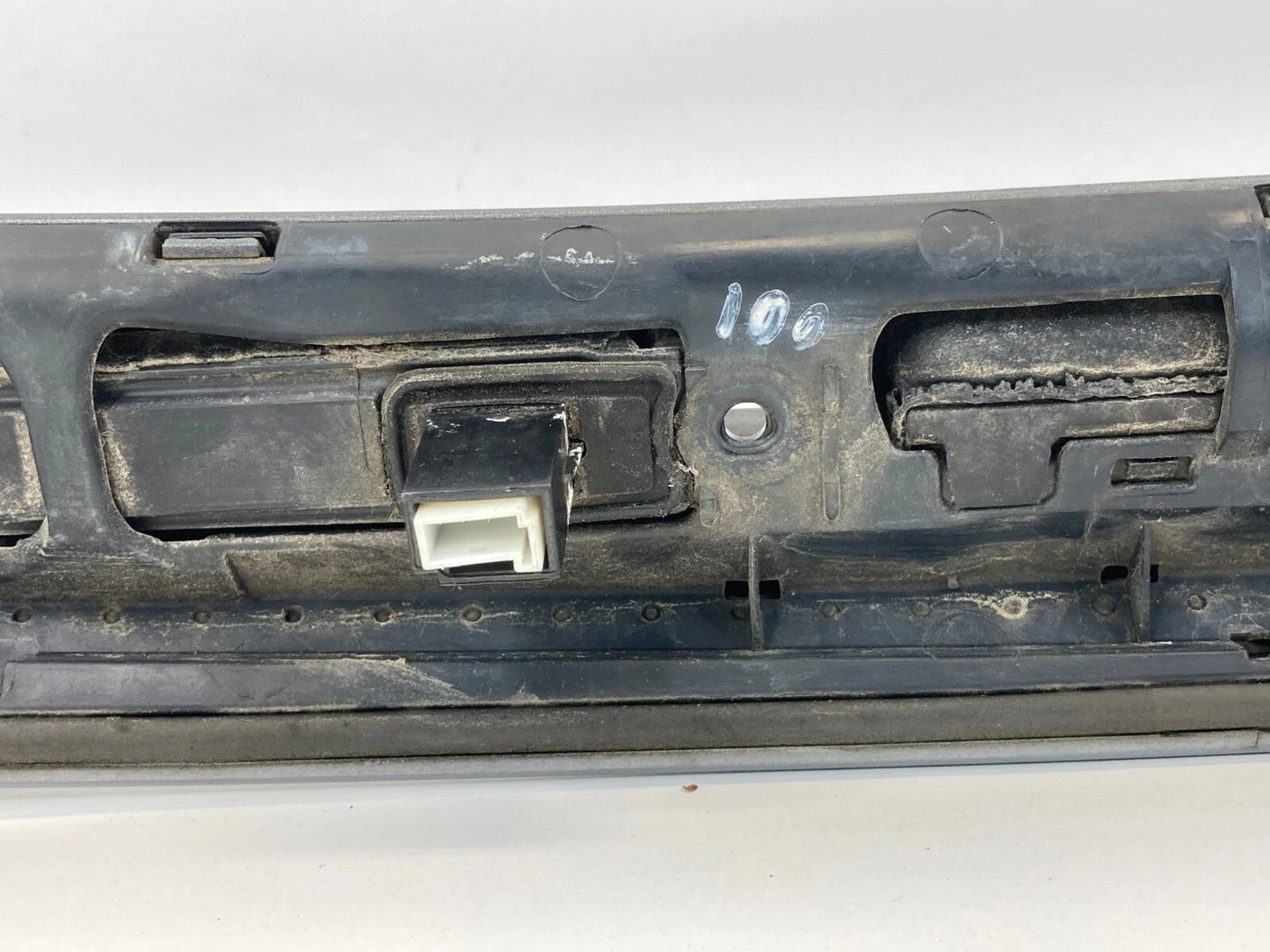 2004-2010 BMW X3 REAR TRUNK GARNISH STRIP LICENSE PLATE MOLDING TRIM 51137052452