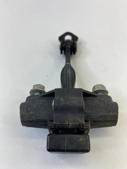 2006-2011 FORD FOCUS SEDAN REAR LEFT DRIVER SIDE DOOR LOCK CHECK STOP STOPPER