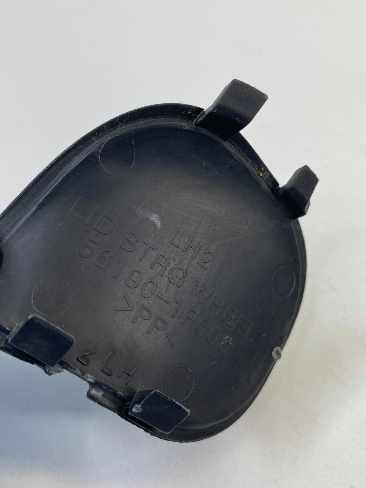 2005-2010 KIA SPORTAGE LEFT SIDE STEERING WHEEL PLASTIC LID COVER TRIM CAP OEM