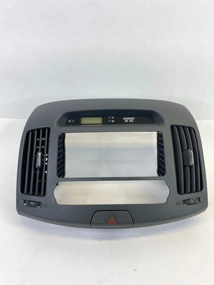 07-10 HYUNDAI ELANTRA DASH RADIO BEZEL AC AIR VENT TRIM W/ DIGITAL CLOCK OEM