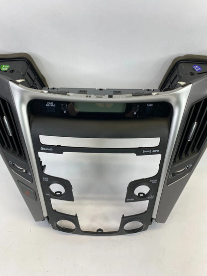 11-14 HYUNDAI SONATA CENTER DASH RADIO CLIMATE CONTROL BEZEL W/AIR VENTS & CLOCK