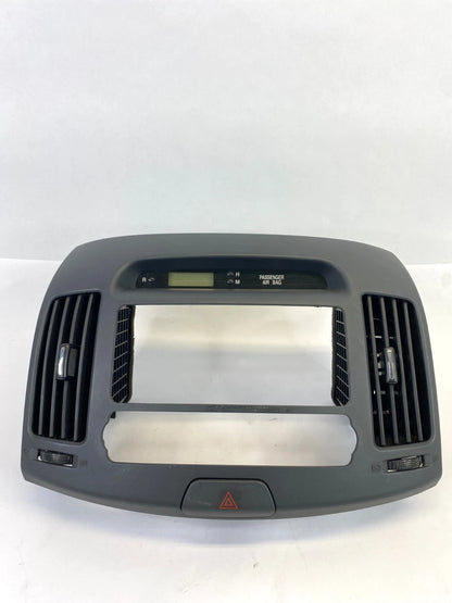 07-10 HYUNDAI ELANTRA DASH RADIO BEZEL AC AIR VENT TRIM W/ DIGITAL CLOCK OEM