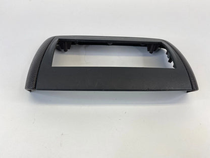 2008-2012 BUICK ENCLAVE REAR CENTER CONSOLE FLOOR TRIM BEZEL ASSEMBLY 25814789