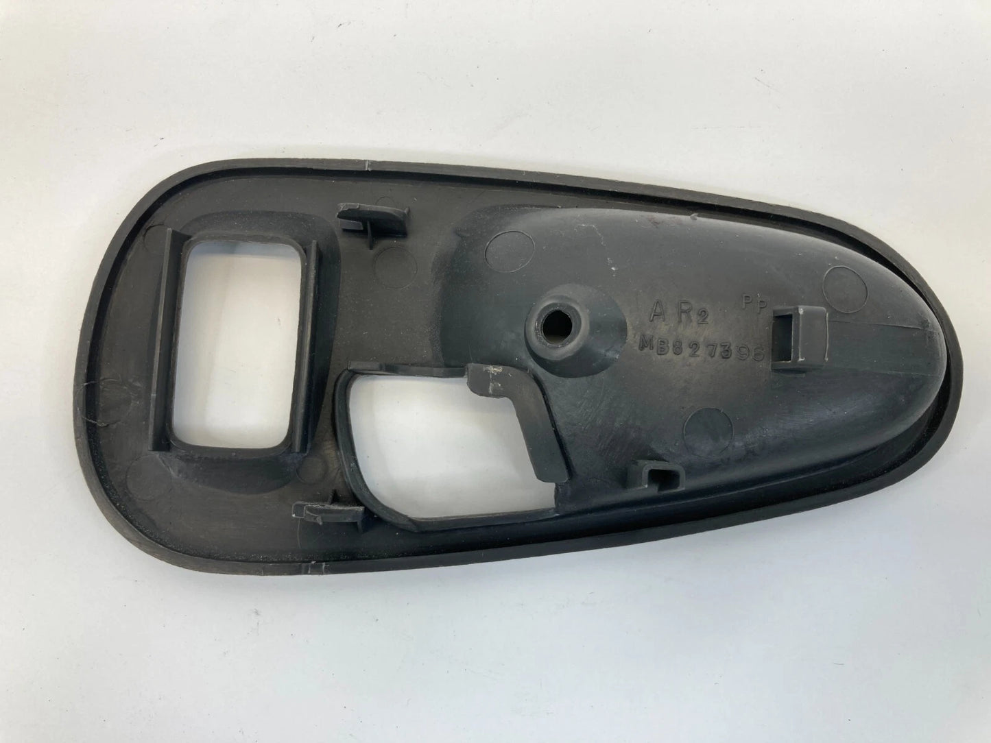 1997-2004 MITSUBISHI MONTERO SPORT REAR RIGHT SIDE INNER DOOR HANDLE COVER TRIM