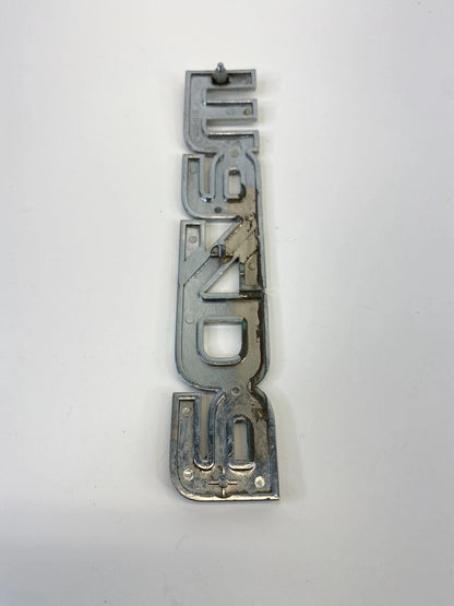 2000-2006 MAZDA MPV REAR TRUNK LID SYMBOL NAMEPLATE BADGE LOGO LC62-51710 OEM