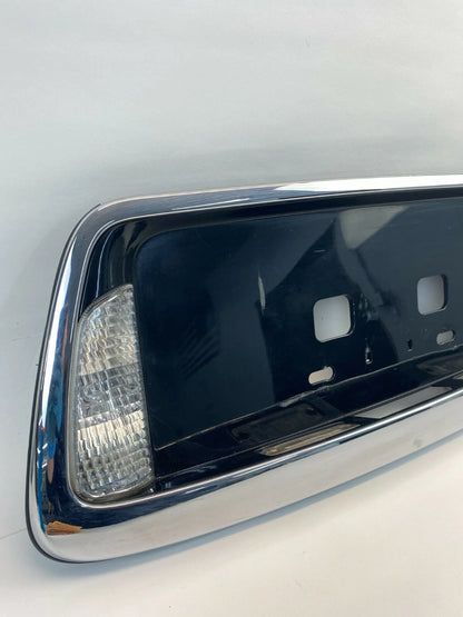 2004-2006 KIA AMANTI REAR TRUNK LID LICENSE PLATE BEZEL W/ BACKUP LAMPS 873713F0