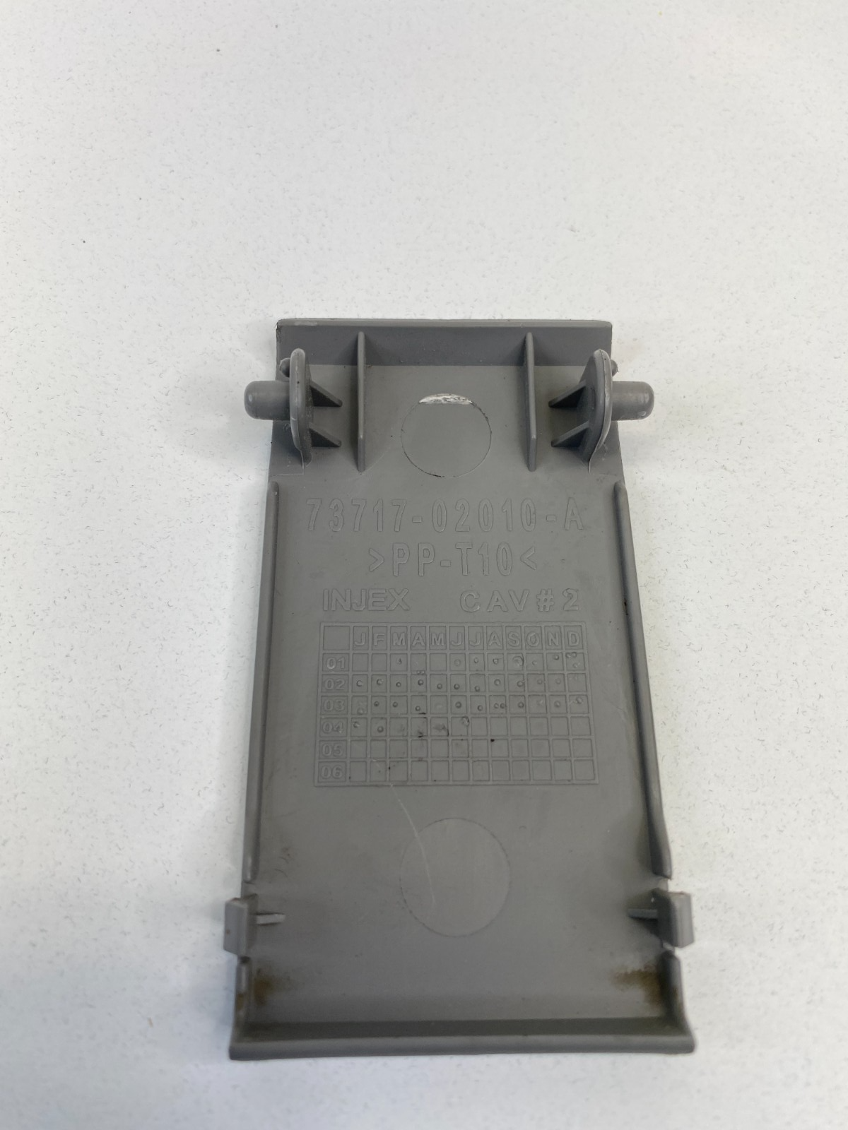 2003-2008 Toyota Corolla Rear Desk Child Anchor Seat Cover Trim 73717-02010-A