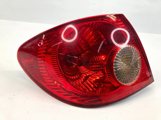 05-08 TOYOTA COROLLA SEDAN REAR LEFT SIDE OUTER TAILLIGHT TAIL LIGHT LAMP OEM