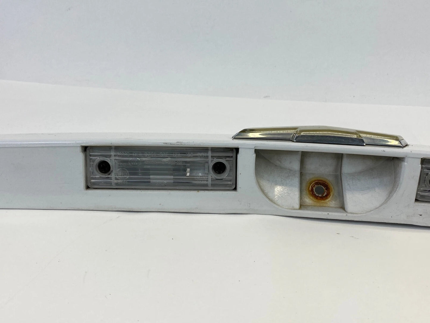 07-11 CHEVY AVEO 5 AVEO5 HATCHBACK REAR TRUNK LICENSE PLATE MOLDING LIGHT EMBLEM