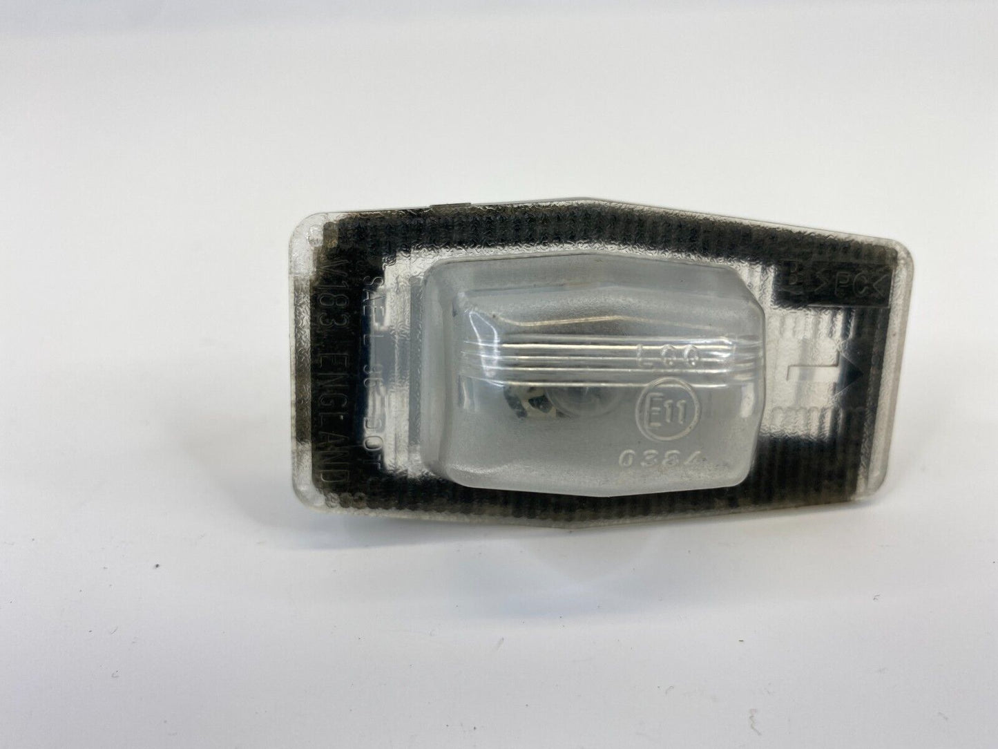 00-06 Mazda MPV 01-06 Tribute Rear Tailgate License Plate Light Lamp E110384 OEM