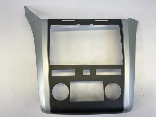 2009-2012 CHEVROLET TRAVERSE DASH RADIO CLIMATE BEZEL COVER TRIM 20989249 OEM
