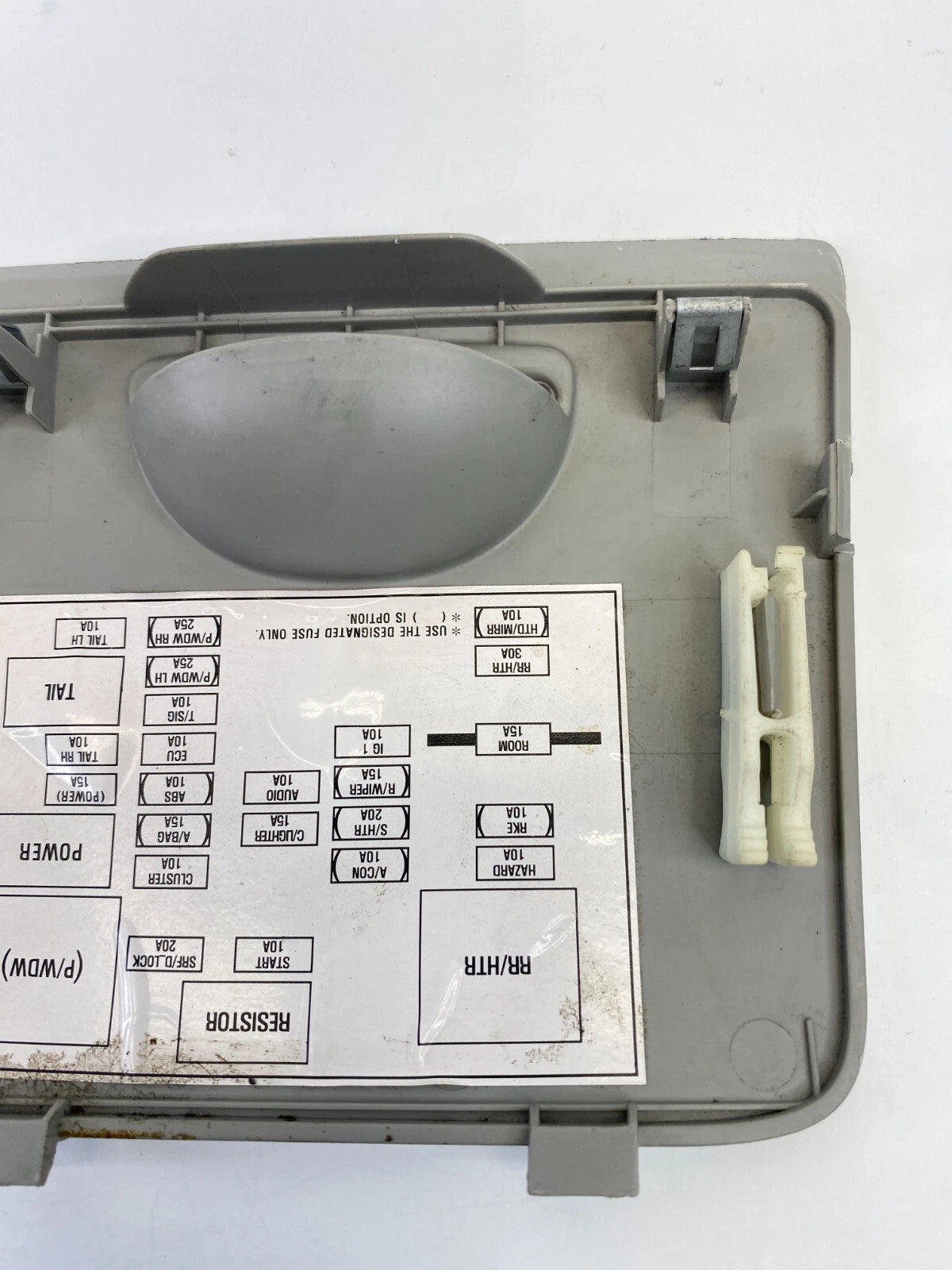 2004-2009 KIA SPECTRA DASH INSTRUMENT PANEL FUSE BOX ACCESS COVER DOOR LID PANEL