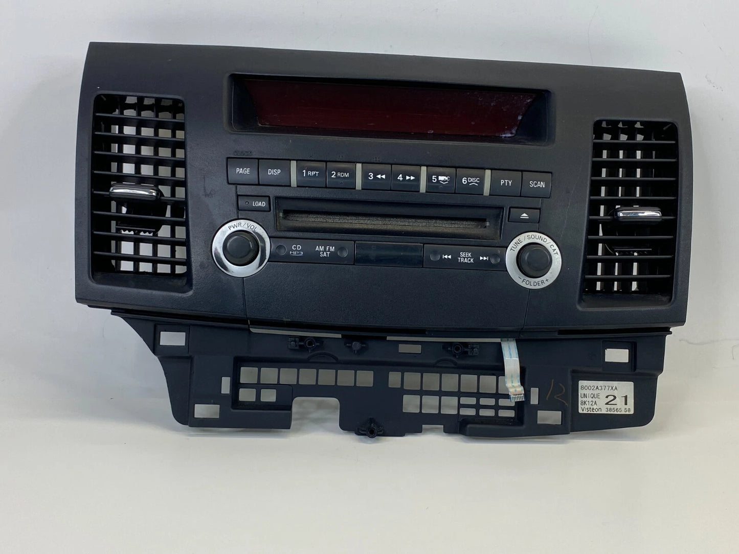 08 09 MITSUBISHI LANCER DASH PANEL RADIO AM/CD PLAYER W A/C VENTS 8002A377XA OEM