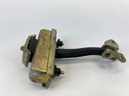 96-07 DODGE CARAVAN FRONT RIGHT PASSENGER DOOR CHECK HINGE STOPPER 04717228AC